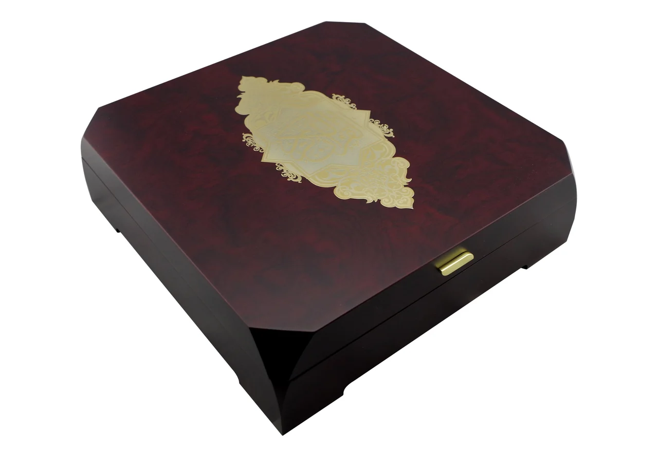 Mahogany Qur'an box with cut corners and a medallion plate, item 82404